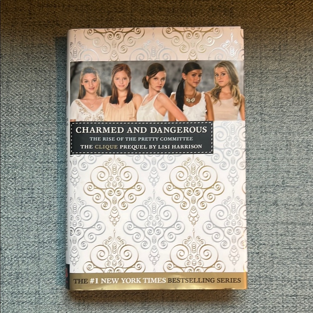 Charmed and Dangerous Hardcover Book